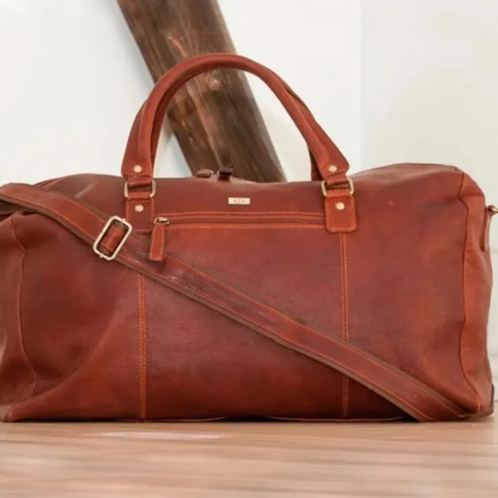 Rejsetaske i Columbia læder & Kreafunk aGO mini Bluetooth højtaler