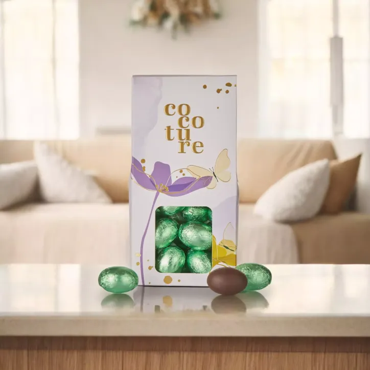 Cocoture fyldte grønne folieæg i lilla dragébox
