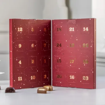 Julekalender af fyldte chokolader med appelsin m.m