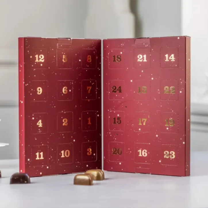 Julekalender af fyldte chokolader med appelsin m.m