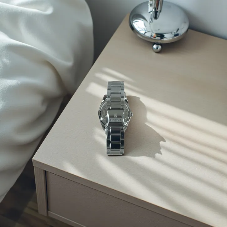 Festina dameur med stållænke og mineralglas