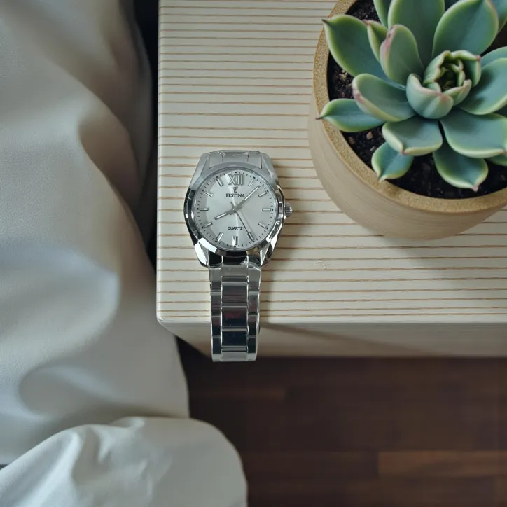 Festina dameur med stållænke og mineralglas